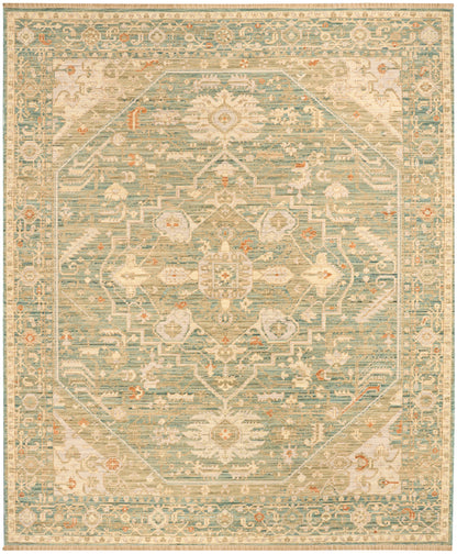 Turquoise and cream distressed vintage area rug with a central floral medallion and ornate border.