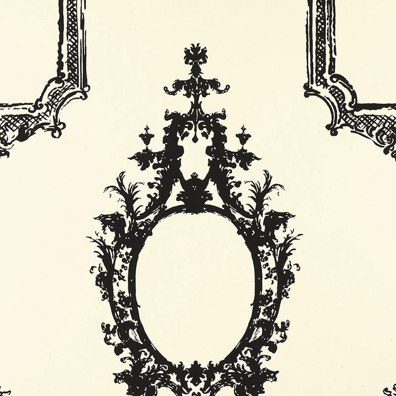 Black ornate rococo oval frame silhouette with floral vines on cream background; decorative wall pattern.