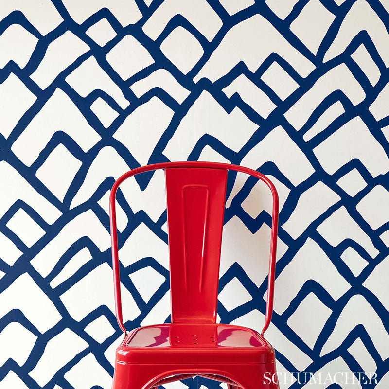 Soft chartreuse wallpaper with an exuberant geometric pattern.