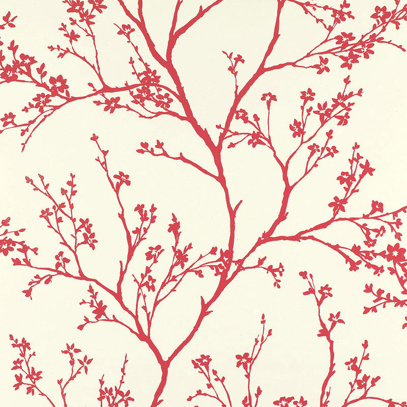 Cream wallpaper with red botanical tree-branch pattern and small blossoms.