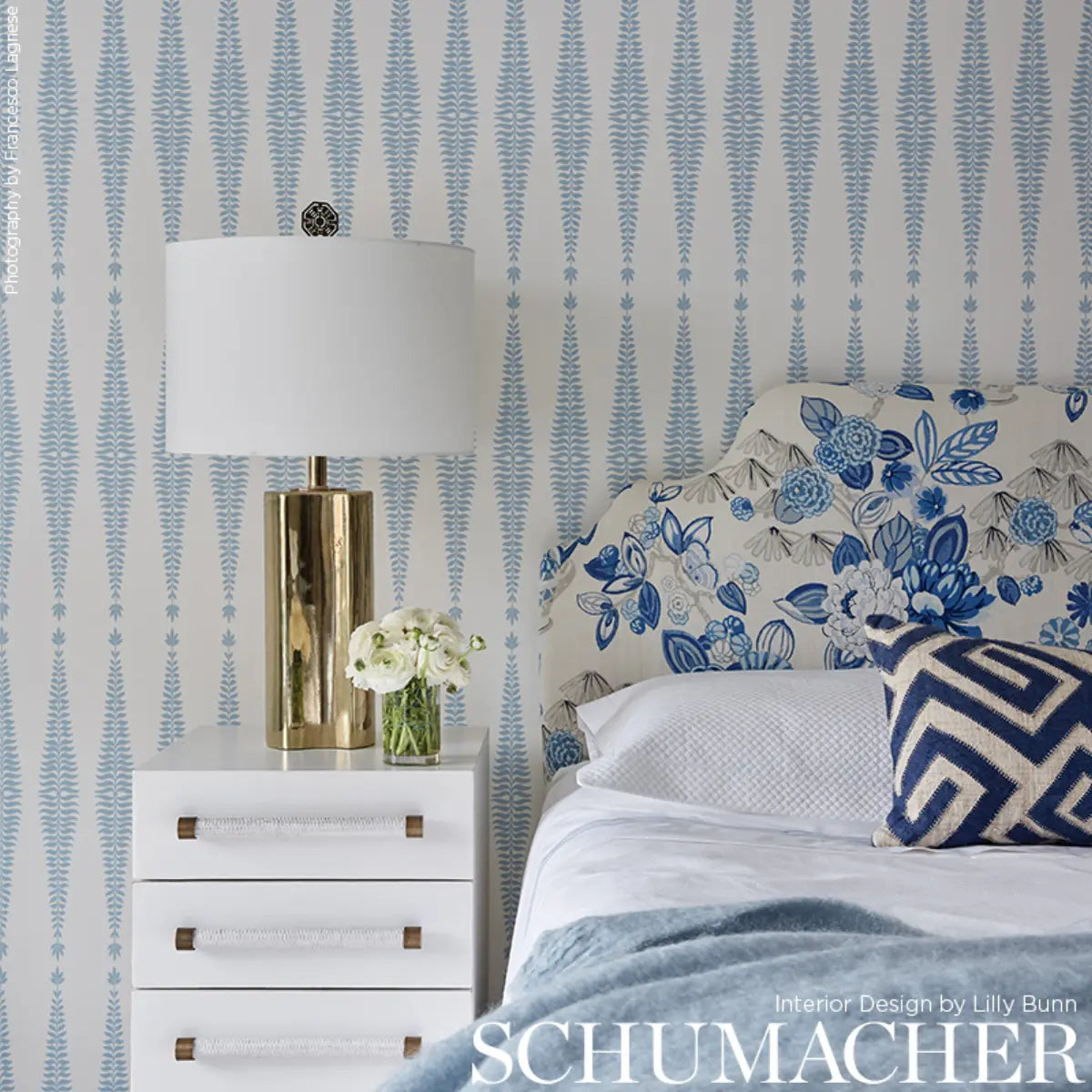 Fern Tree Wallpaper in Sky featuring stylized fern fronds arranged in a repeating geometric diamond pattern. The botanical motif has a soft sky-toned blue accent against a contrasting background, creating a refined balance of nature-inspired detail and modern graphic structure. Ideal for elegant interiors, accent walls, bedrooms, living rooms, and sophisticated designer spaces.