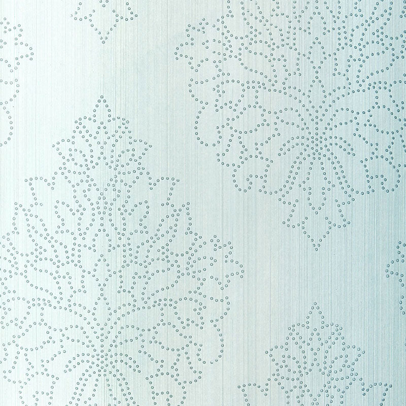 Soft blue textured background with delicate white dotted snowflake motifs in a repeating pattern.