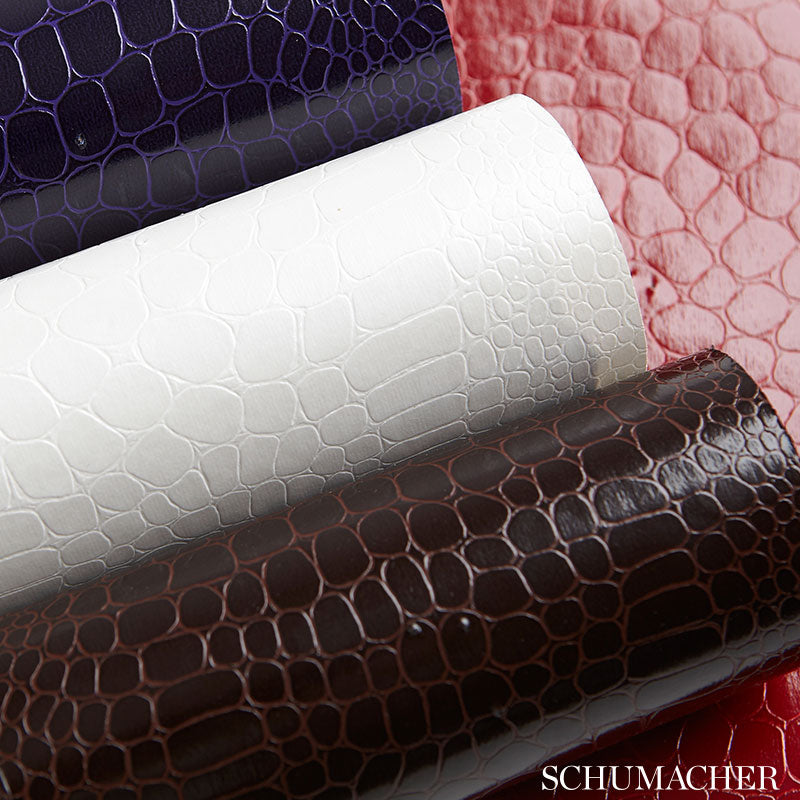 Rolled crocodile-embossed faux leather in purple, white, brown & pink tones, glossy finish.
