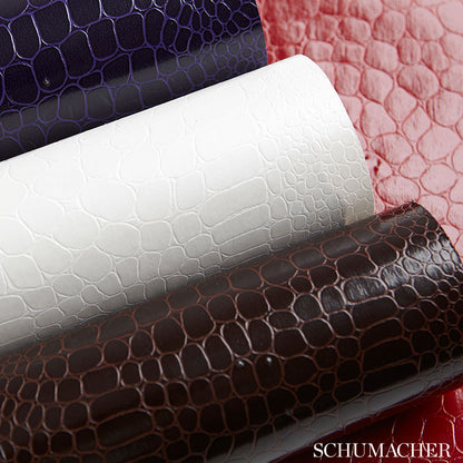 Rolled crocodile-embossed faux leather in purple, white, brown & pink tones, glossy finish.
