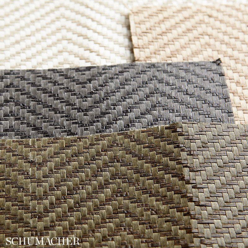 Woven chevron placemats in ivory, taupe, gray and olive; textured straw-like fibers for rustic dining.