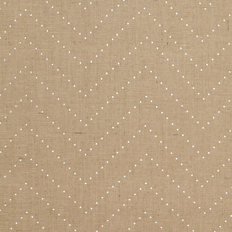 Beige linen fabric with white dotted chevron pattern, versatile upholstery or drapery textile.