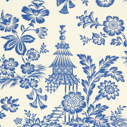 Cobalt blue chinoiserie floral pattern on ivory wallpaper, featuring a pagoda lantern and blooming flowers.