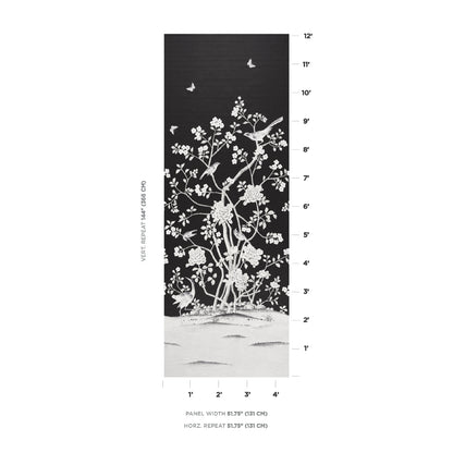 Tall black decorative panel featuring white botanical blossoms and birds in a nature-inspired mural.