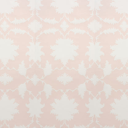 Soft pink damask wallpaper with white ornate floral motifs; classic decorative wall covering.
