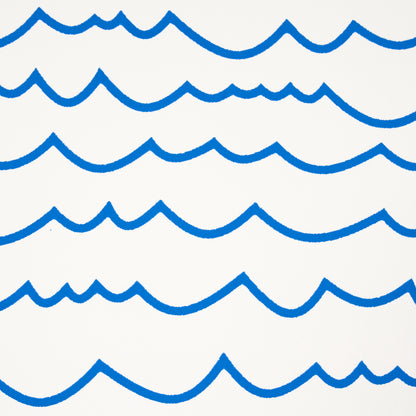 White backdrop with repeating bold blue wave pattern, nautical style for textiles or decor.