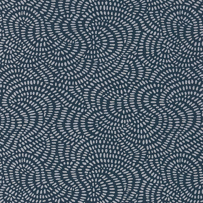 Navy blue wallpaper with pale gray dotted spiral motifs forming swirling circular patterns.