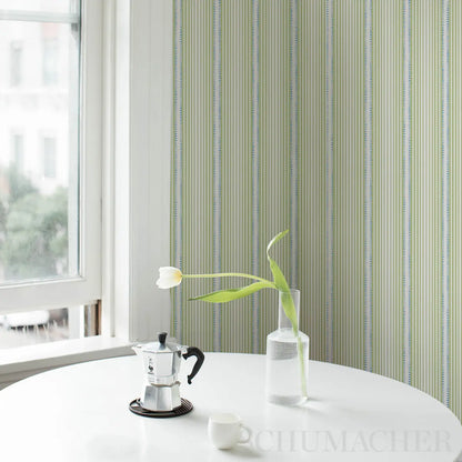 Schumacher Moncorvo wallpaper in green and blue featuring narrow gradient stripes with stippled hand-drawn texture, ideal for luxury interior design, feature walls, modern home décor, and elegant wallcoverings.