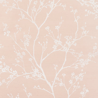 Peach pink wallpaper with white delicate tree branches and blossom pattern.