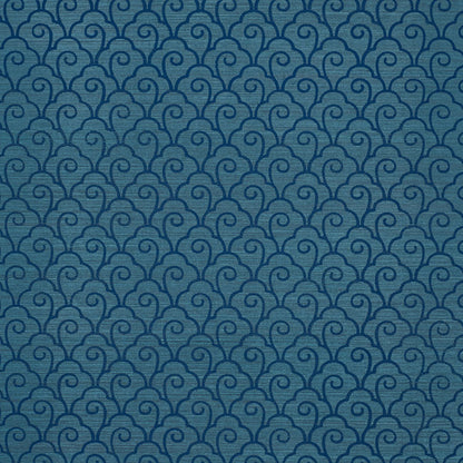 Blue-teal repeating swirl-scroll scallop filigree pattern on a sisal rug; textured surface.