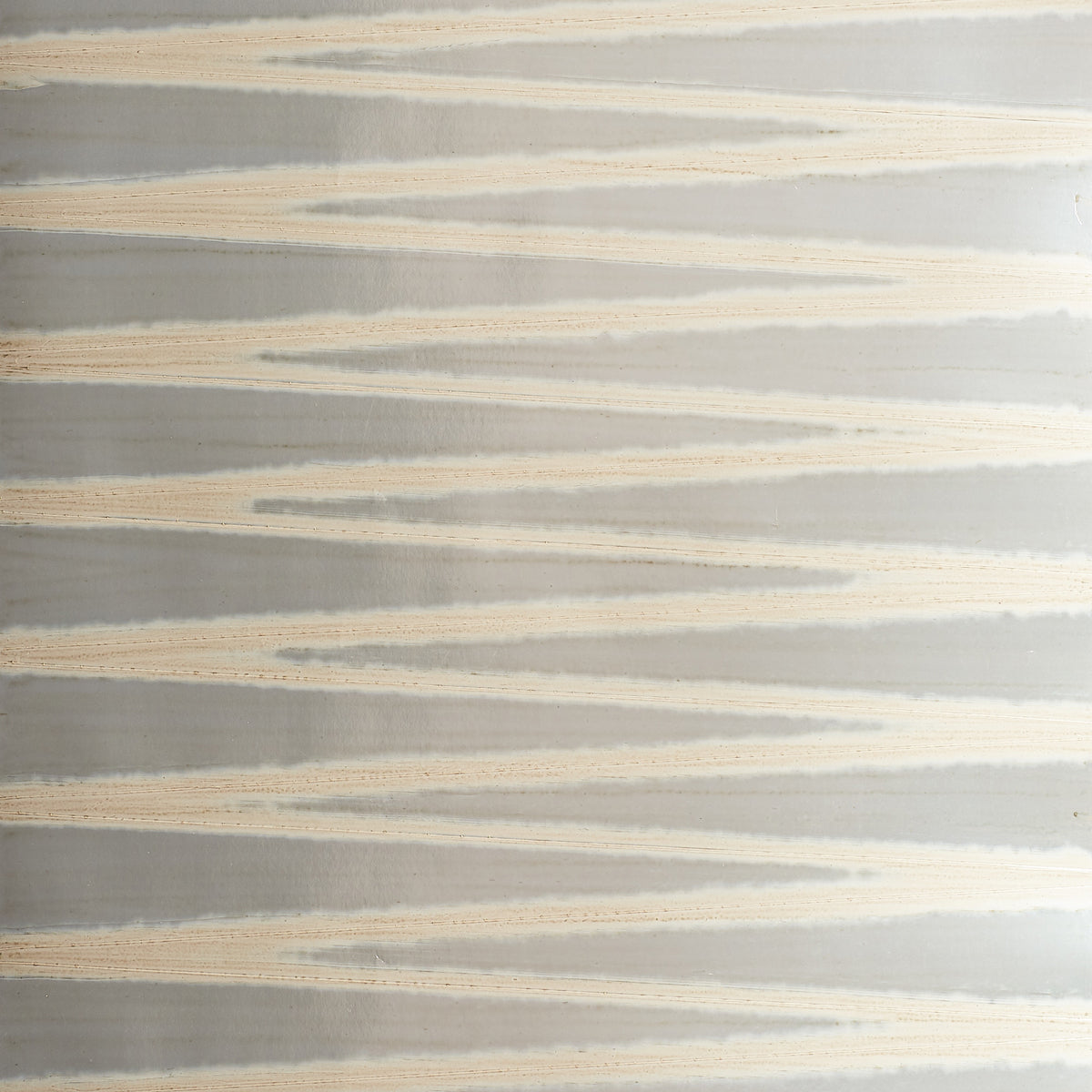 Gray wallpaper with cream diagonal brush-stroke stripes for a modern, subtle wall accent.