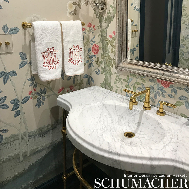 Aqua panel wallpaper set with an ornate, classic pattern on the wall.
