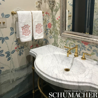 Aqua panel wallpaper set with an ornate, classic pattern on the wall.