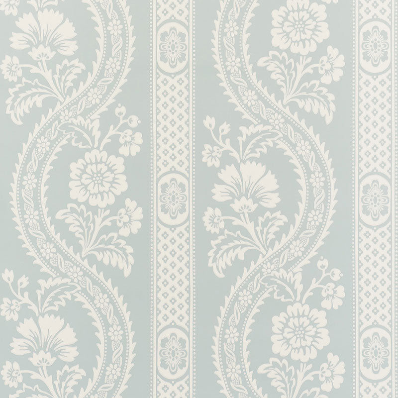 Light blue wallpaper with white damask floral pattern & vertical ornamental panels.