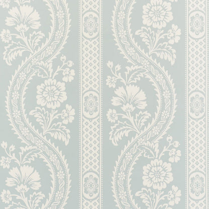 Light blue wallpaper with white damask floral pattern & vertical ornamental panels.