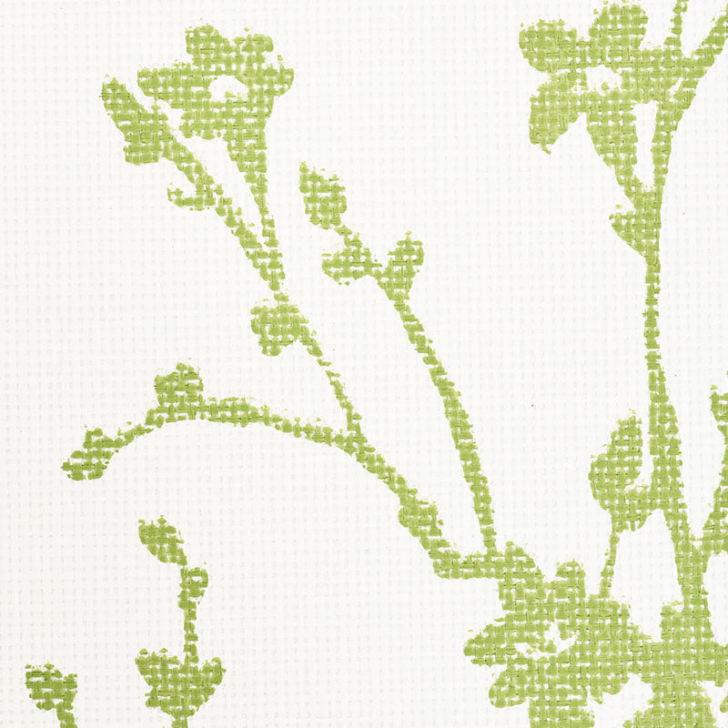 Cream fabric with light green botanical vine print; leafy stems in a crosshatched texture for upholstery or wallpaper.