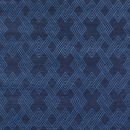 Dark blue woven fabric with interlocking light-blue diamond geometric pattern; decorative textile or rug design.