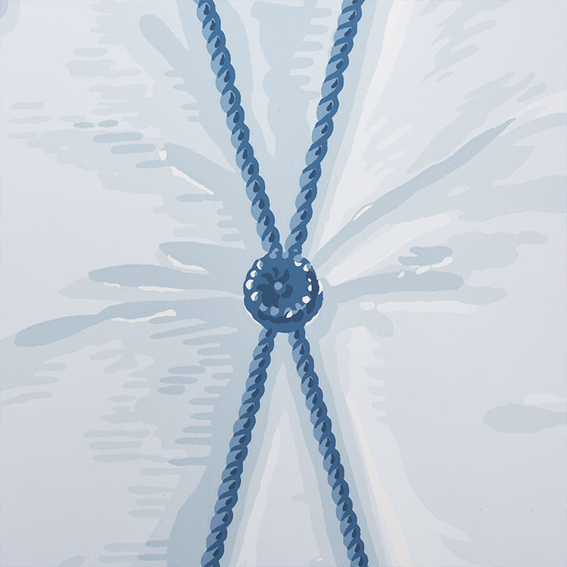 Blue rope necklace with a central circular bead knot and crossed double strands, nautical style.