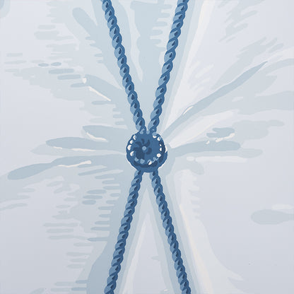 Blue rope necklace with a central circular bead knot and crossed double strands, nautical style.