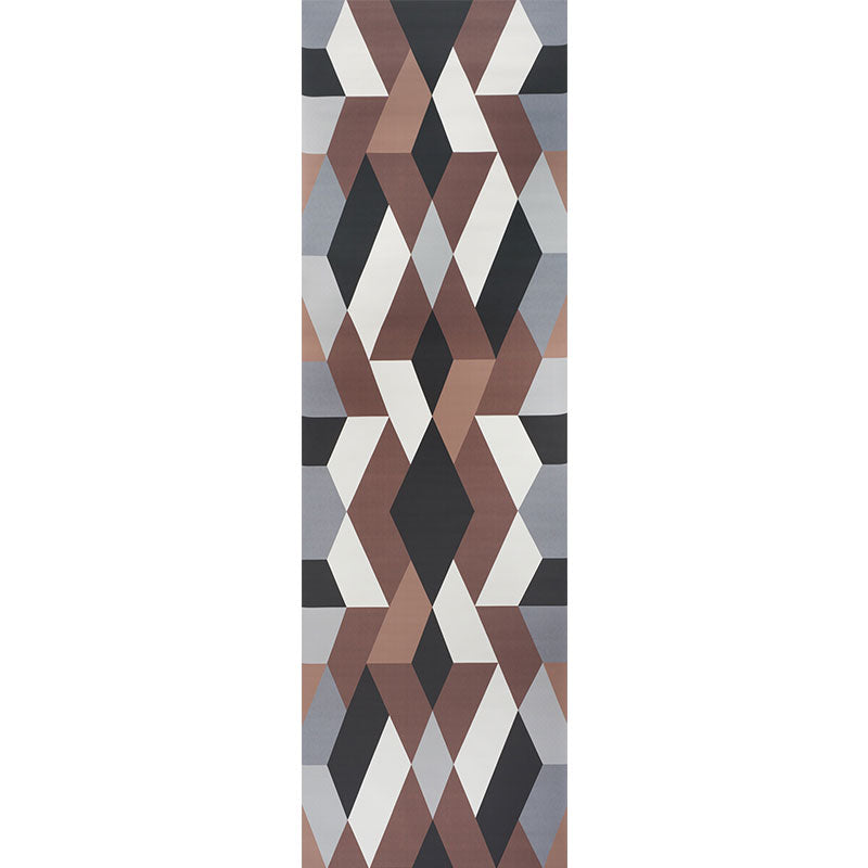 Geometric diamond-pattern runner rug in browns, grays, taupe, ivory and black.