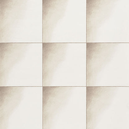 Cream ceramic wall tiles in a 3x3 grid with subtle brown gradient and visible grout lines.
