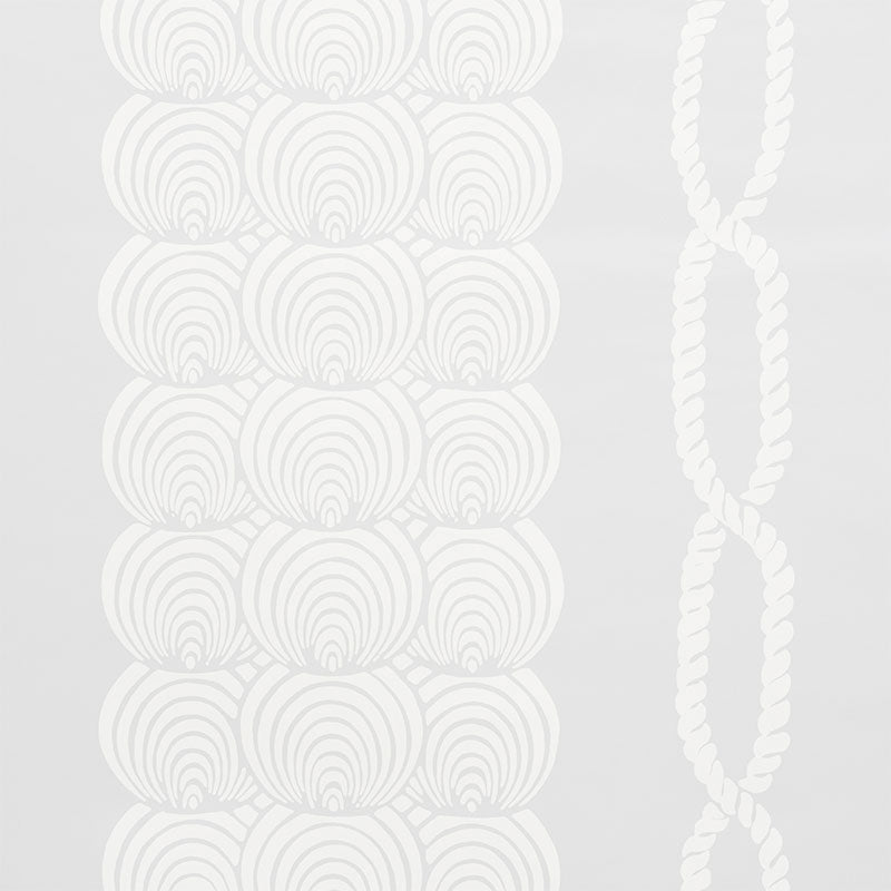 White decorative wall hanging featuring stacked circular discs with spiral patterns and a twisted rope accent.