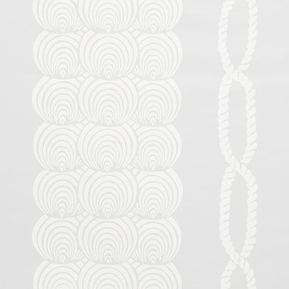 White decorative wall hanging featuring stacked circular discs with spiral patterns and a twisted rope accent.