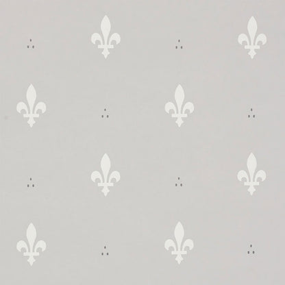 Light gray wallpaper with white fleur-de-lis motifs in a repeating ornamental pattern.