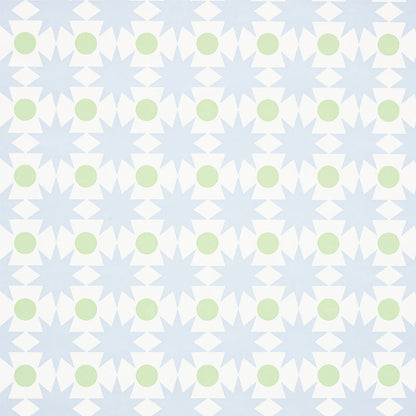 Patterned wallpaper featuring light blue starbursts and mint-green circles on white background.