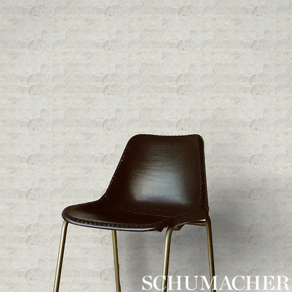 Abalone Pearl dining chair with a curved back and brass-tone metal legs, mid-century modern style.