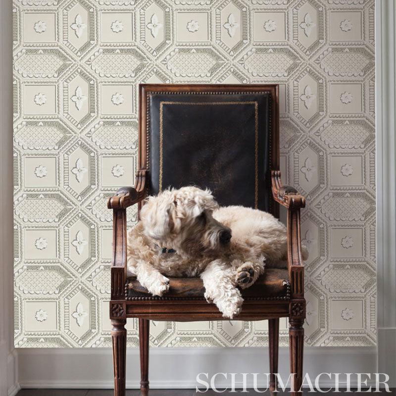 Cream trompe l'oeil stone wallpaper with subtle textured pattern.