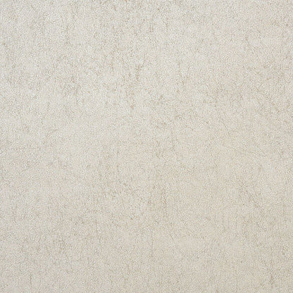 Beige textured wallcovering with mottled, sandy finish.