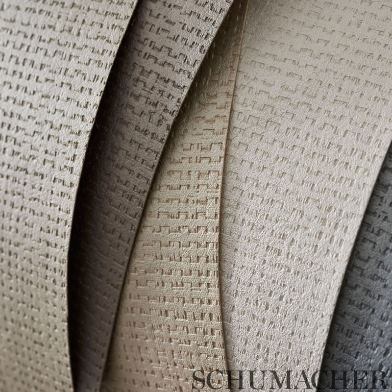 Set of textured wallcoverings in cream, tan, taupe and gray with a woven crosshatch pattern, stacked.