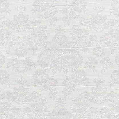 Soft silver grasscloth wallpaper with a subtle damask floral pattern for vintage elegance.