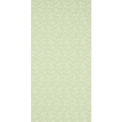 Soft lime-green wallpaper with delicate white botanical vine pattern and repeating floral motif.