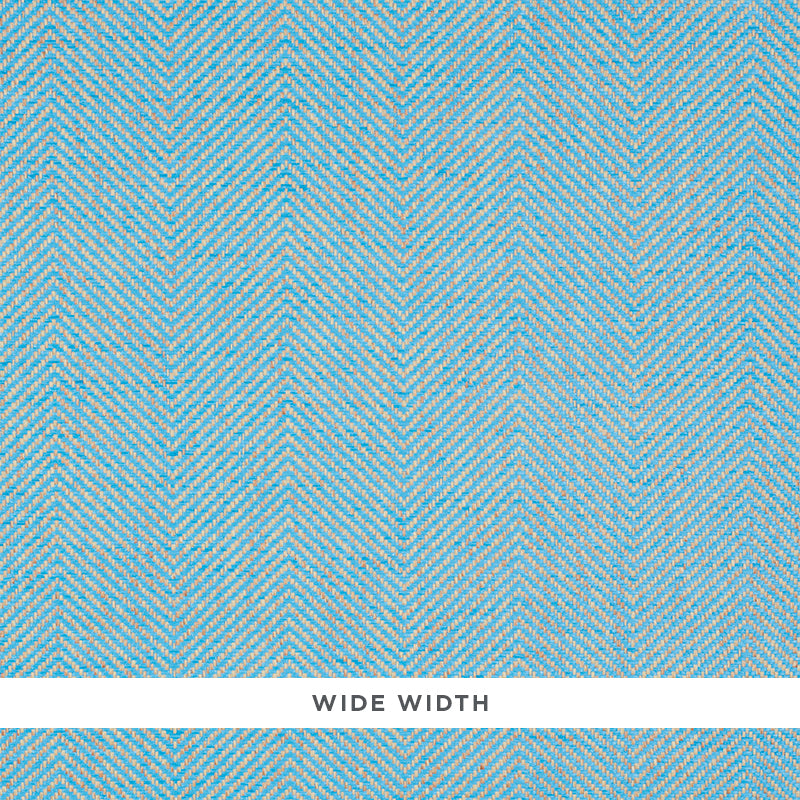 Sky blue herringbone textured wallcovering with cream accents; wide width label visible.