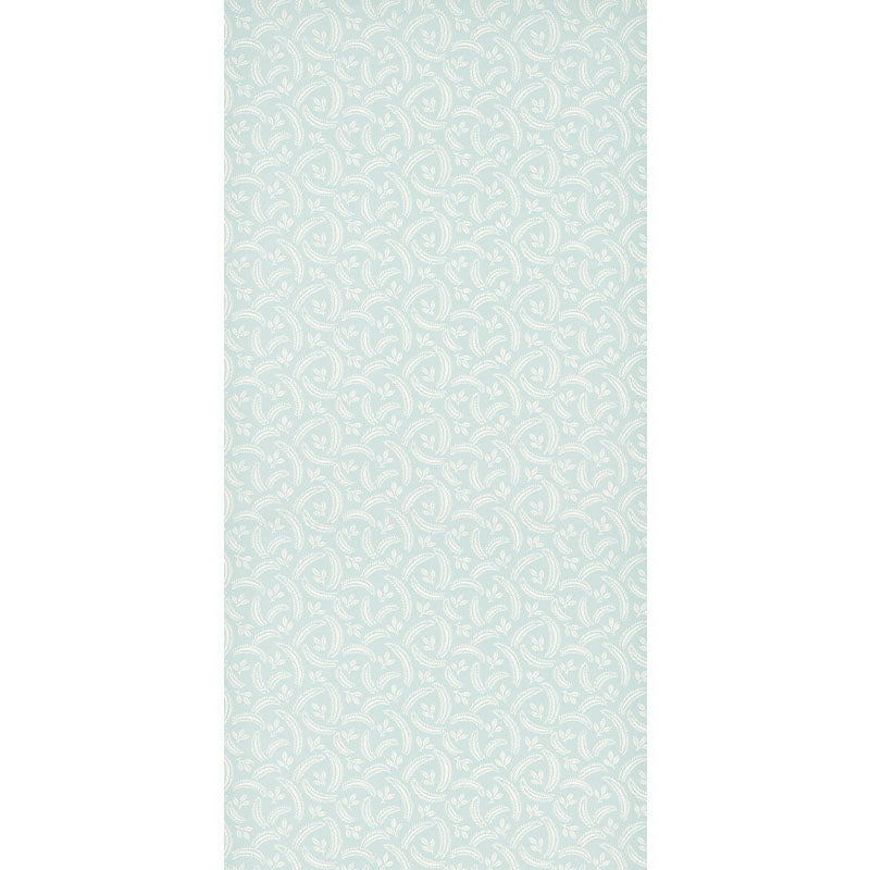 Pastel teal wallpaper with white circular floral motifs in a repeating damask pattern.