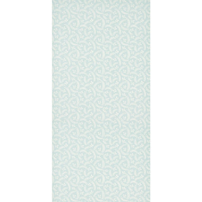 Pastel teal wallpaper with white circular floral motifs in a repeating damask pattern.