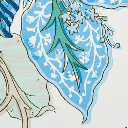 Blue and turquoise botanical pattern with white tree-like motifs and emerald-green leaves, watercolor-style textile design.