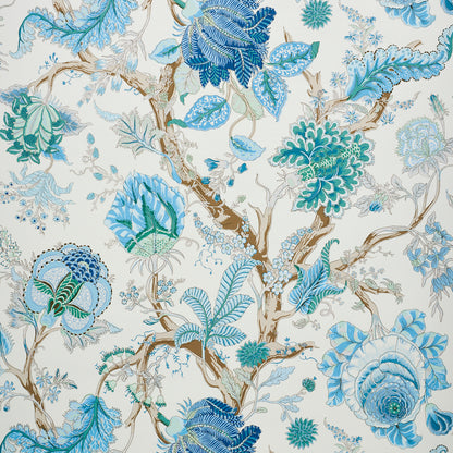 Blue and teal botanical wallpaper featuring brown branches with a peacock motif on a cream background.