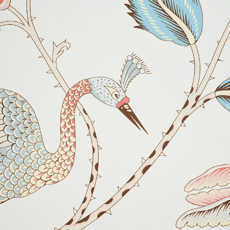 Whimsical pastel wallpaper print of a long-necked pink-blue peacock with crest perched on brown branches and blue-pink leaves.