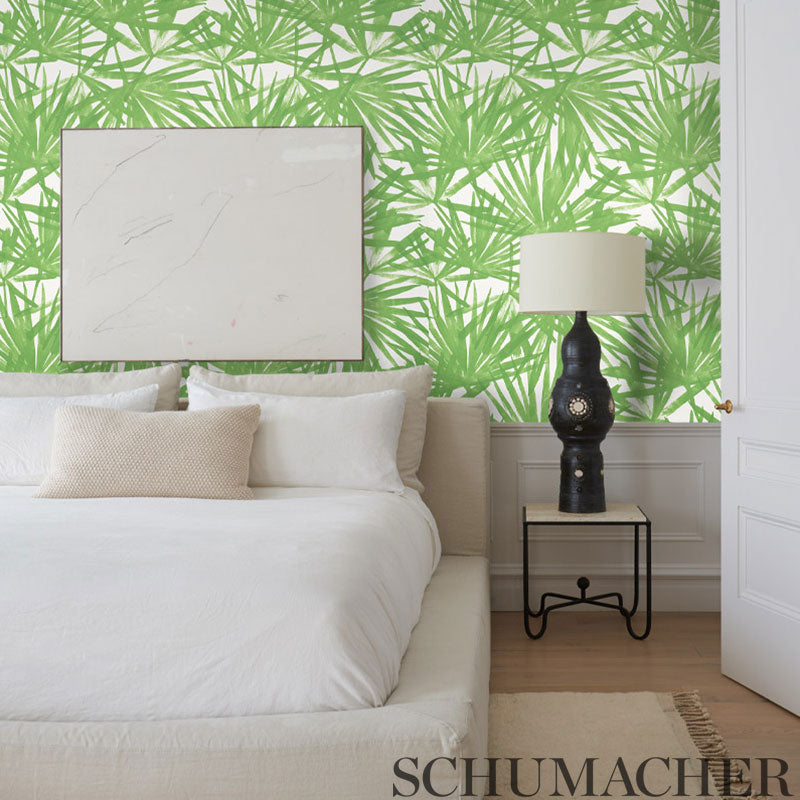 Blue palm-leaf wallpaper featuring a tropical palm motif.
