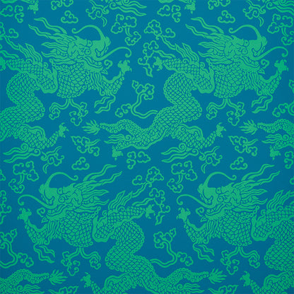 Teal dragon damask pattern on royal blue fabric; seamless decorative textile print with mythical dragon motifs.