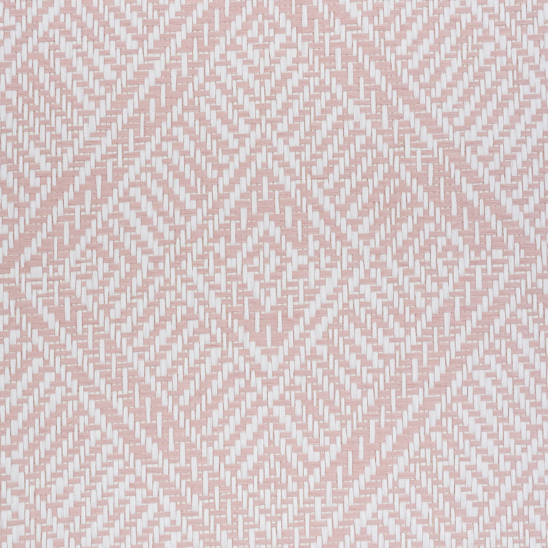 Pink and white woven wallcovering with a geometric diamond lattice pattern.