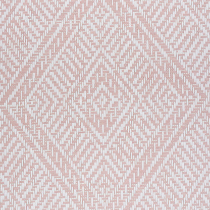 Pink and white woven wallcovering with a geometric diamond lattice pattern.