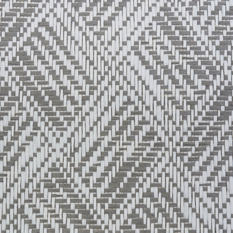 Grayscale woven wallcovering with interlaced light and dark strips forming a geometric diamond/chevron weave.